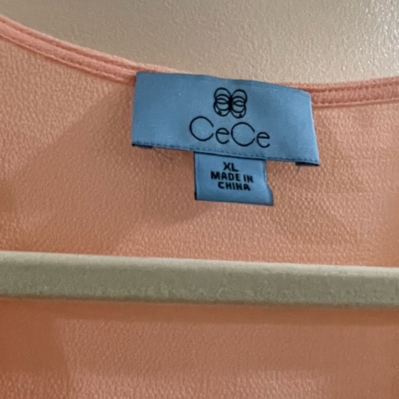 NWT blouse from CeCe. Gorgeous light peach color. Short sleeves and V neck. - Picture 3 of 3